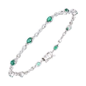 14K WG 1/4 ct. tw. Diamond & 1 3/4 ct. tw. Oval Cut Emerald Station Bracelet