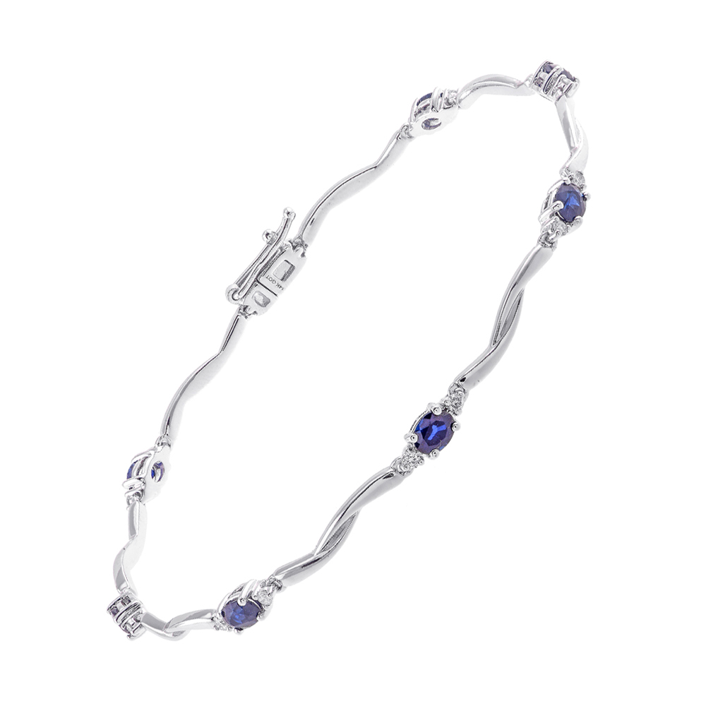 14K WG 1/5 ct. tw. Diamond & 1 1/2 ct. tw. Oval Cut Sapphire Station Bracelet