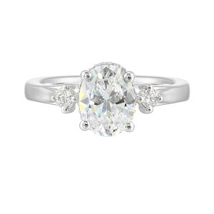 14K WG 1/6 ct. tw. Diamond Three Stone Engagement Ring. Semi Mount for 2 ct. tw. Oval Center.